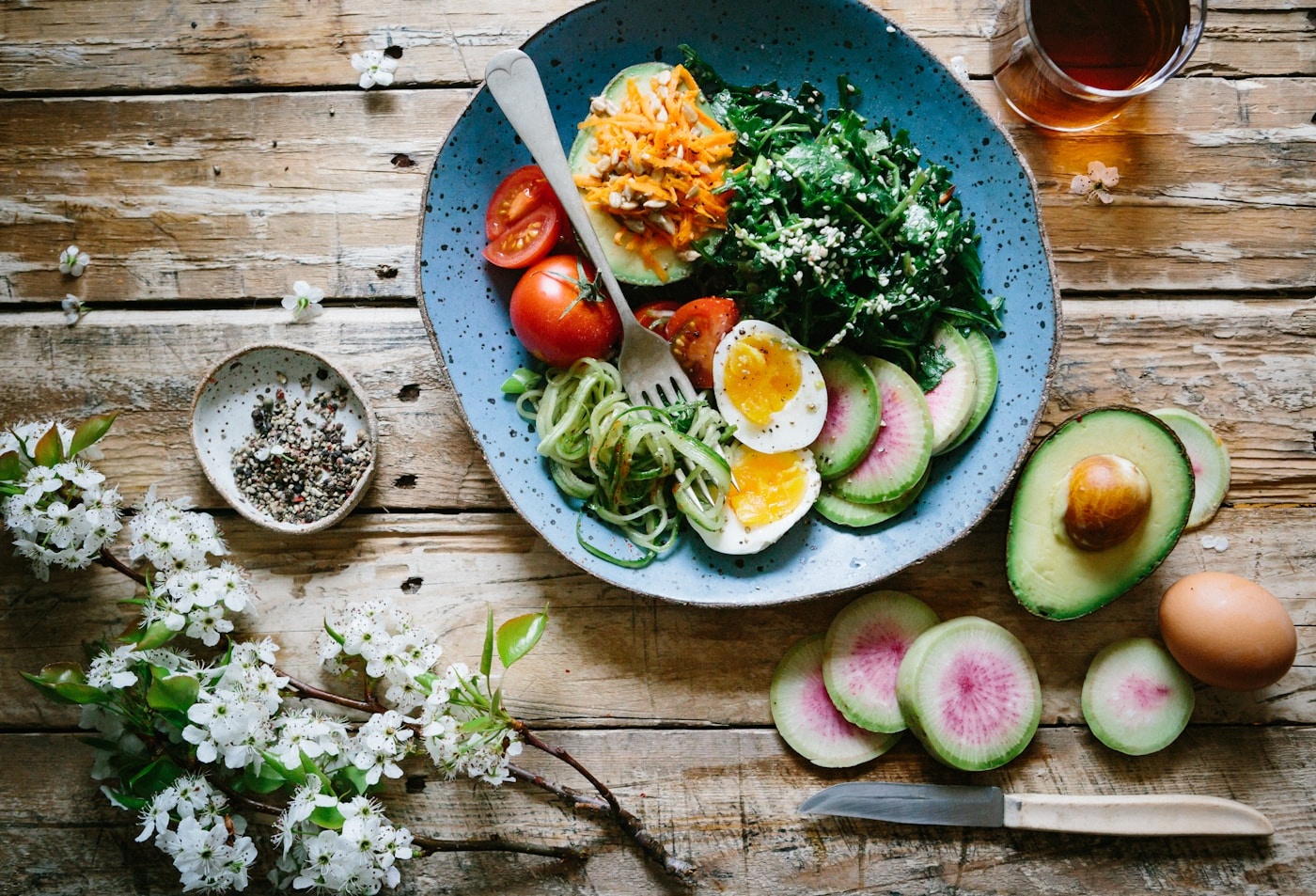 Beautiful spread of fresh, colorful whole foods and vegetables